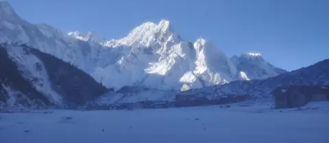 Manaslu's west face above Bimtang in the morning